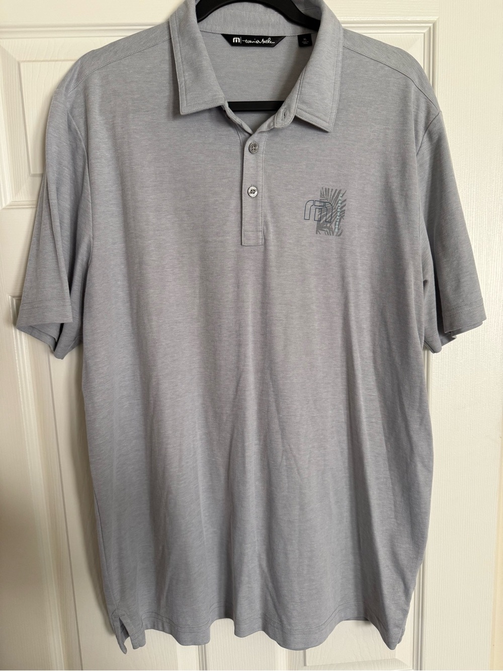 Travis Mathew Light Gray Polo with Chest and back logo